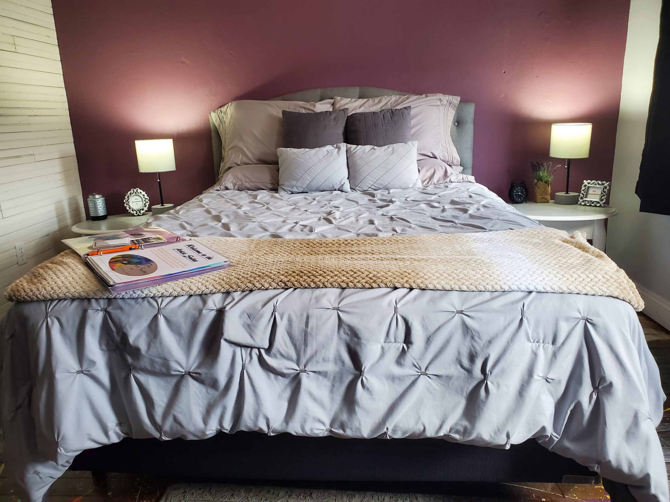 Pollock room with gray comforter and purple walls